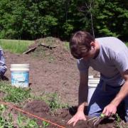 Austin and Ryan preparing the soil for planting